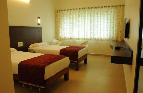 Hassan Hotel | Palguni Residency