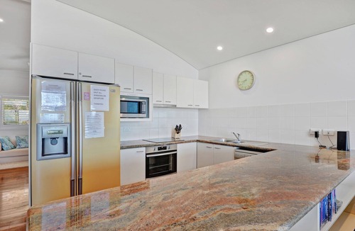 Point Lookout Apartment | Panoramic ocean and beach views from this beautifully appointed two.