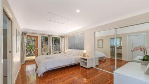 Pretty Beach House | 'Pretty Beach Bay Vista' by HolidayCo