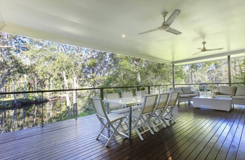 Cooroibah House | Rare wilderness riverfront 15 mins from Hastings St