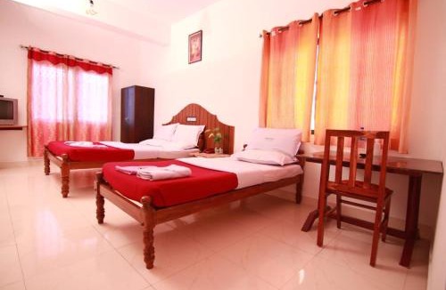 Vazhayil Hotel | Rays Inn Thekkady