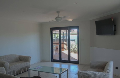 Harrington House | Relax and unwind with just a stroll across the road to the water