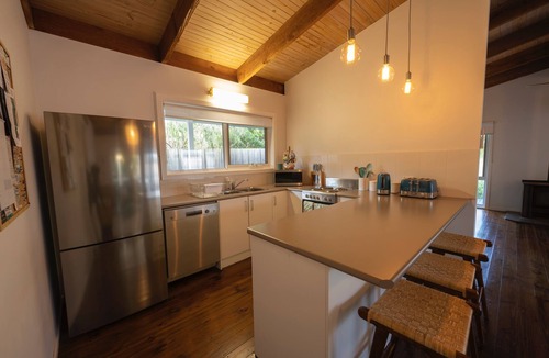 Blairgowrie House | Relax in this boho coastal home walking distance to beautiful beach