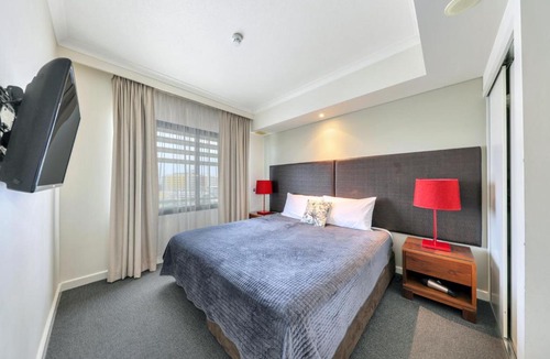 Darwin City Centre Apartment | Resort Style Escape King Bed Pool Balcony
