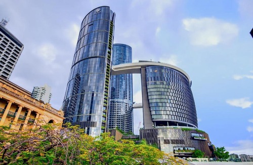 Brisbane Central Business District Apartment | River Glow at Queens Wharf Level 43 including PARKING, Pool, and Views
