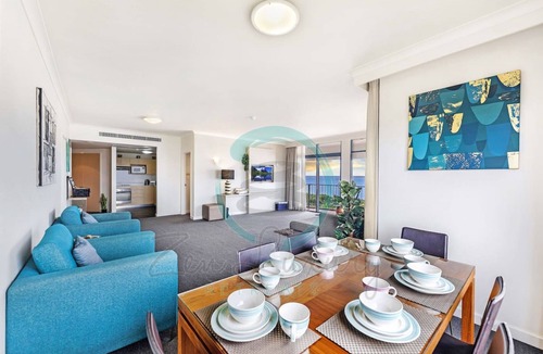 Darwin City Centre Apartment | Rustic Sunset Horizon Oceanview Balcony Dining