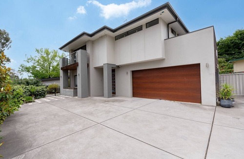 Curtin House | Serene 3-Bedroom Oasis with Pool & Lush Garden