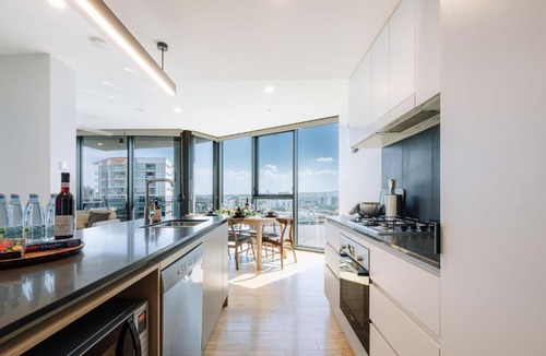 South Brisbane Apartment | Skyline Serenity 2BR Apt with River & City Views