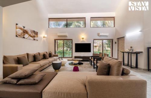 Vedic Village Villa | StayVista at Simply Beige with Jacuzzi, Wi-Fi, BBQ