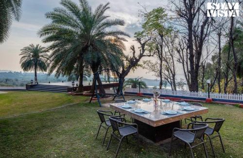 Pathankot Villa | StayVista's Lake Pearl Serenity - Riverside, Mountain-View Villa with Jacuzzi, Sprawling Lawn & Terrace