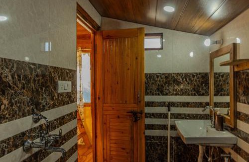 Naina Range House | Stone Age Huts and Hostel