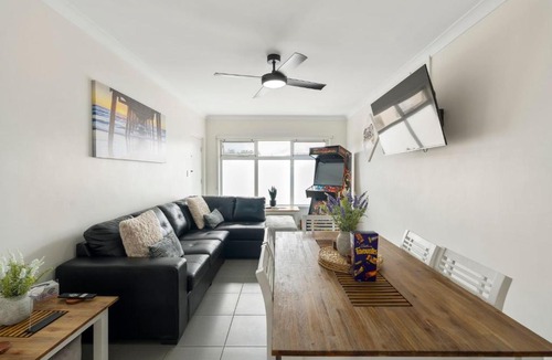 West Beach Apartment | Stylish Seaside Suite with Arcade and Balcony