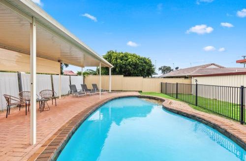 Urangan House | 'The Aussie Classic' Poolside Living by the Marina