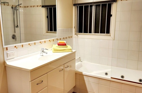 Wavell Heights House | The Heights! Comfortable, cosy Queenslander cottage with a retro vibe.