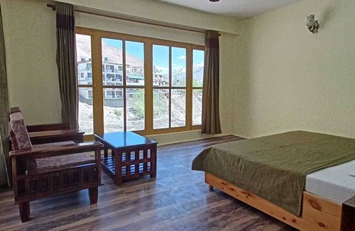 Kaza Hotel | The old monk