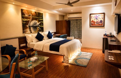GIDC Hotel | The Palm Regency Beacon Vapi