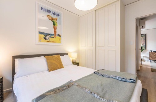 Prahran Apartment | Urban Retro - Experience Vibrant Courtyard Charm