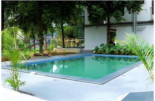 Aluva Hotel | Vajra Periyar Heritage