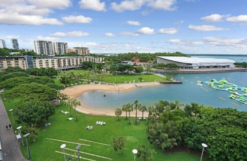 Darwin City Centre Apartment | Vibrant Waterfront Lagoon Views walk to Cafes & BBQ