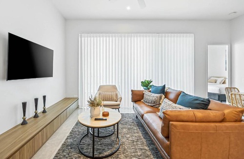 Bokarina Apartment | Waterfront 2-Bed Oasis - Pool Steam Jacuzzi Gym