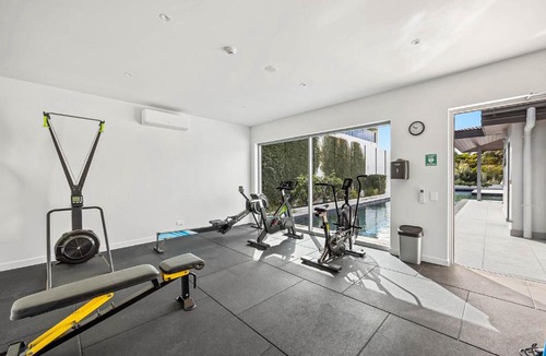 Bokarina Apartment | Waterfront 2-Bed Oasis - Pool Steam Jacuzzi Gym