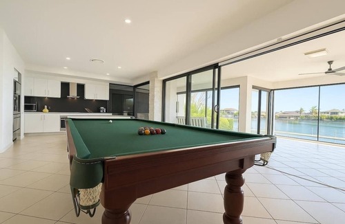 Helensvale House | Waterfront Home with Pool