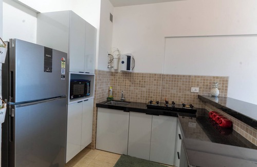 Kadadhe Apartment | Zen Retreat Calm 1BHK with Golf View, Fast Wi-Fi & Daily Cleaning – Pune
