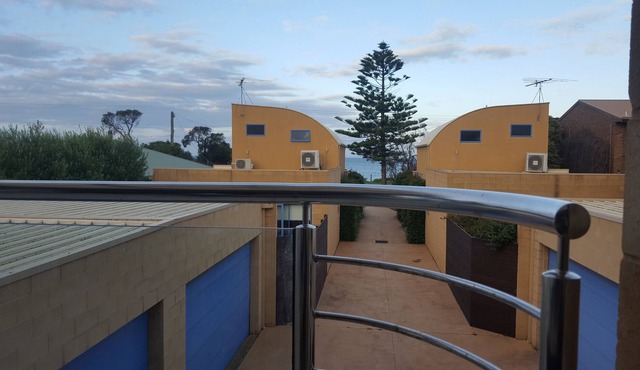 Beachfront water views modern town house in indented head