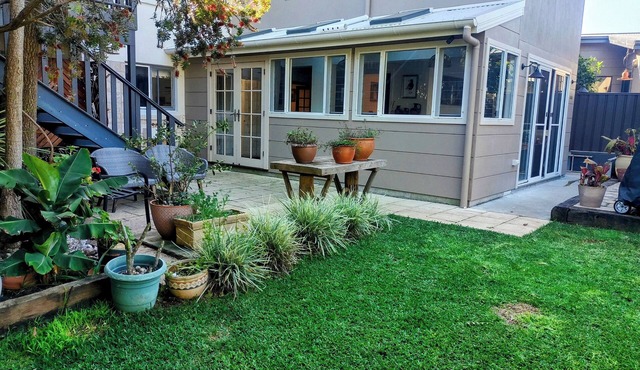 Beautiful eclectic studio with lush private garden and solar heated pool in Kiama