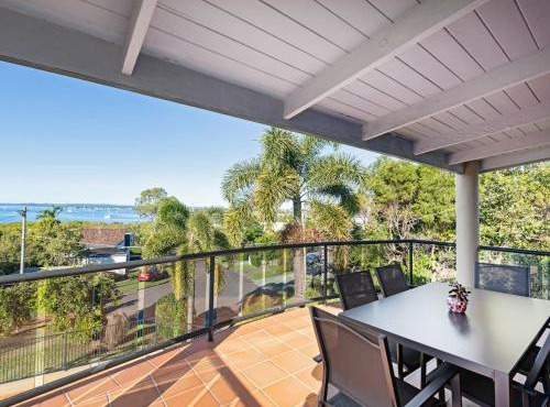 Coastal Family Escape with Pool Balcony and Bay Views