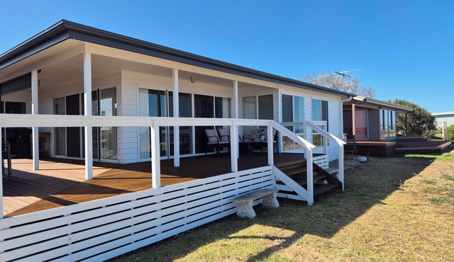 Comfortable 3 bedroom home, absolute beachfront!