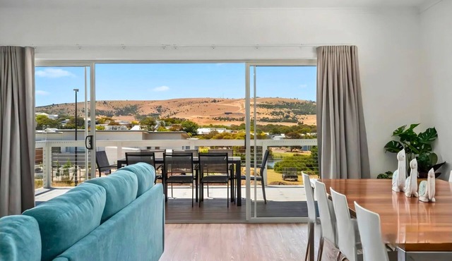 Driftwood & Daydreams: Modern Coastal with Hillside Views & a Swim Spa