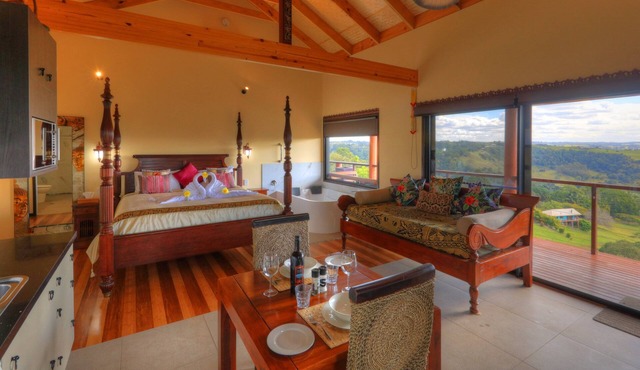 Luxury self-contained villa with double bed, double spa, fireplace, and kitchen.