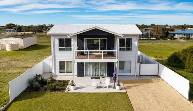 Modern Coastal Retreat | Walk to the Beach | Sleeps 12