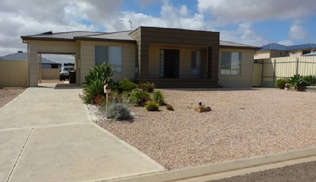 PEBBLES PARADISE is a 4 bed 2 bath modern home a couple minutes from the beach.