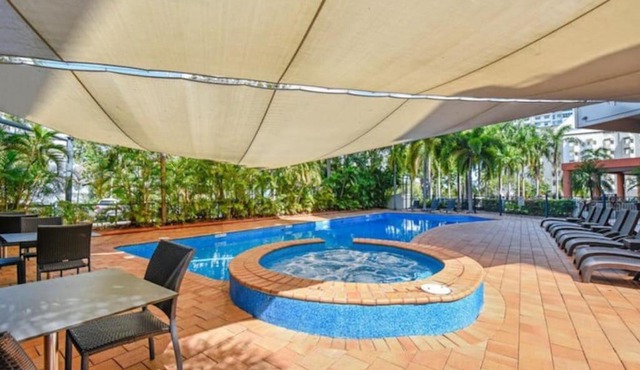 Resort Style Getaway with King Bed Pool and Balcony