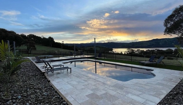 Set on the waters edge at Bonnie Doon. Stunning views and room for 25 guests