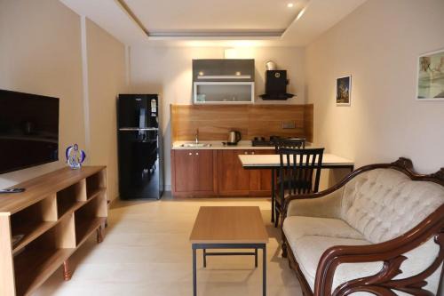 Silver sand Modern 2BHK Stay Near Lakeshore Hospital