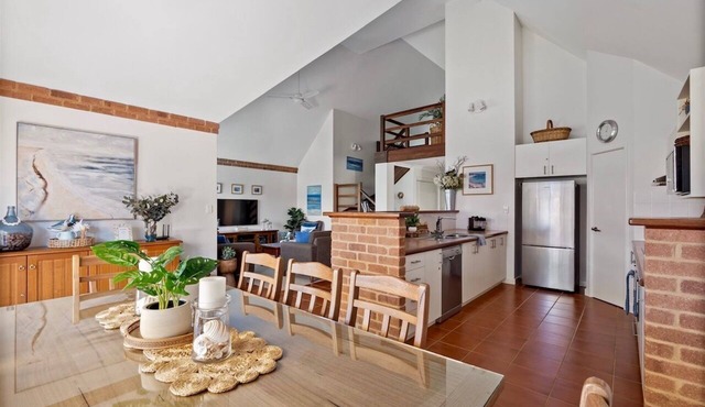 Spacious villa with private outdoor patio overlooking the garden, beach nearby
