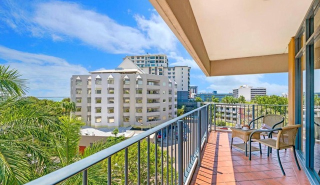 Sweeping Harbourfront Views atop Tropical Resort