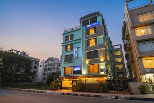 New Town Hotel | FabHotel Prime Familto - Near Bisarjan Ghat
