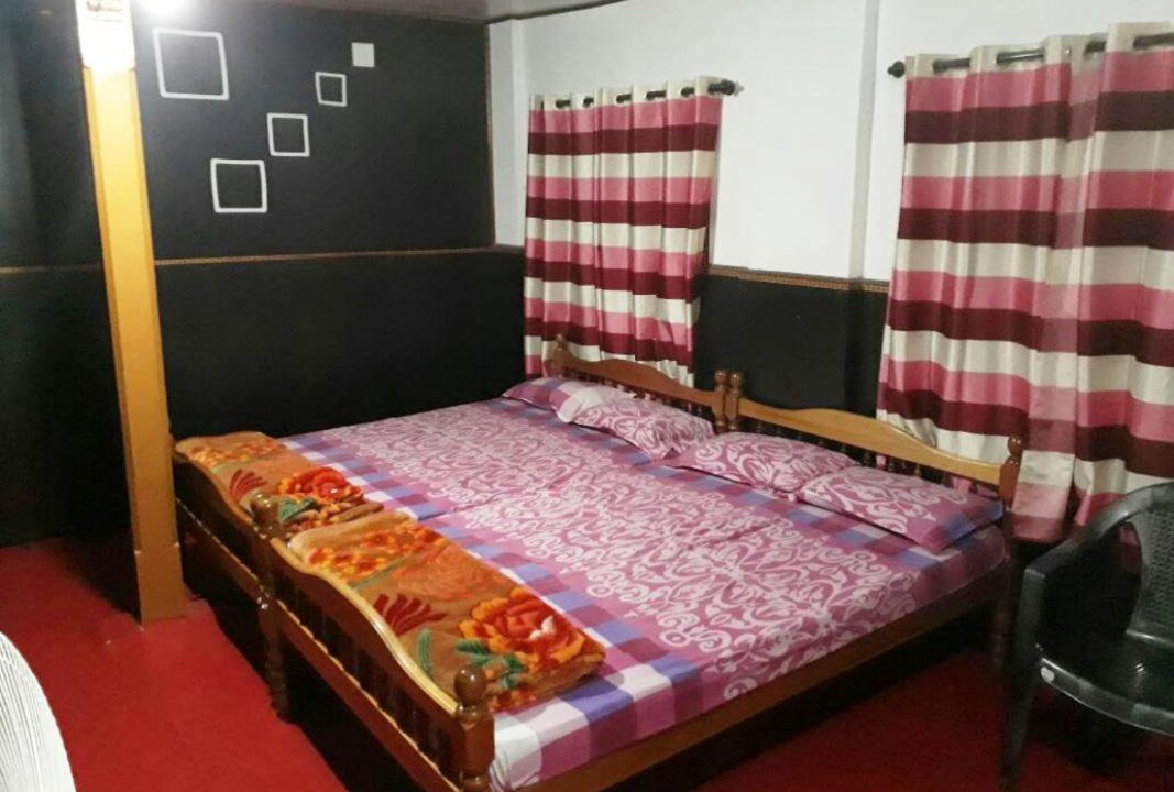 Photo of Bedroom in Valparai