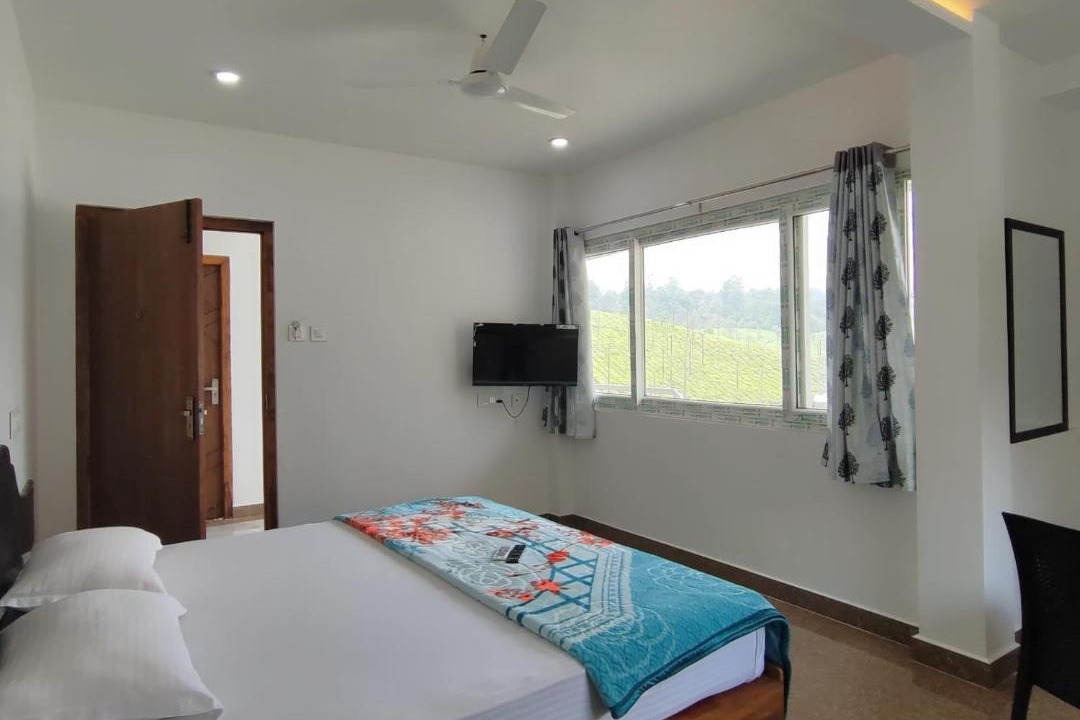 Photo of Bedroom in Valparai